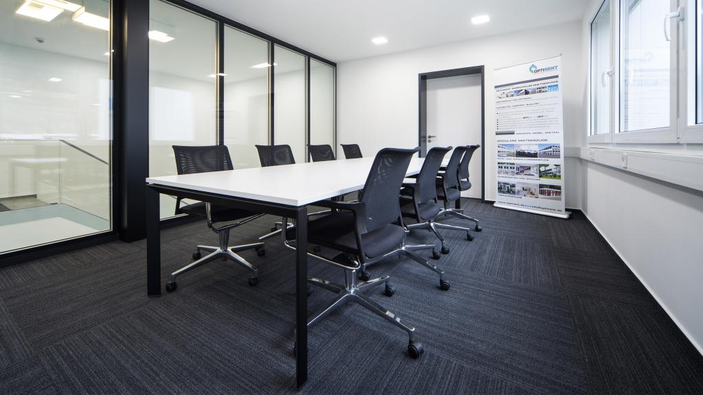 Bright meeting room in Optirent's modular administration building