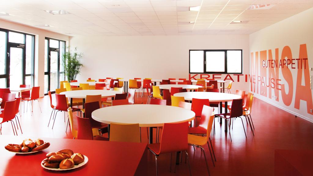 Dining room of the canteen in the modular school with all-day care in Külsheim